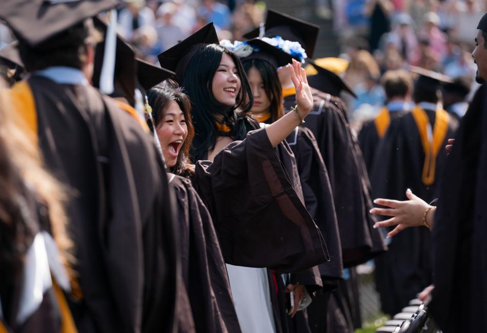 Students wave and cheer during line-up.