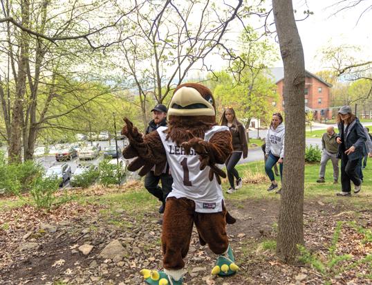 A mascot walking through Lehigh's Forest Park