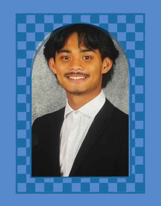 Photograph of a smiling young man in a black suit, within a blue checkered border.