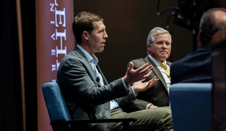 Photograph of a man gesturing and speaking at a Lehigh University panel discussion.
