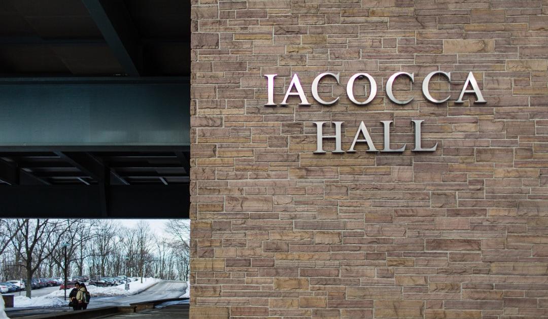 Front of Lehigh University's Iacocca Hall with snow in background