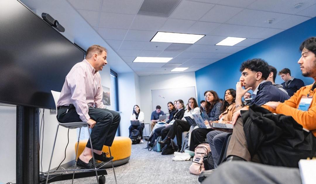 Students talk with an entrepreneur 