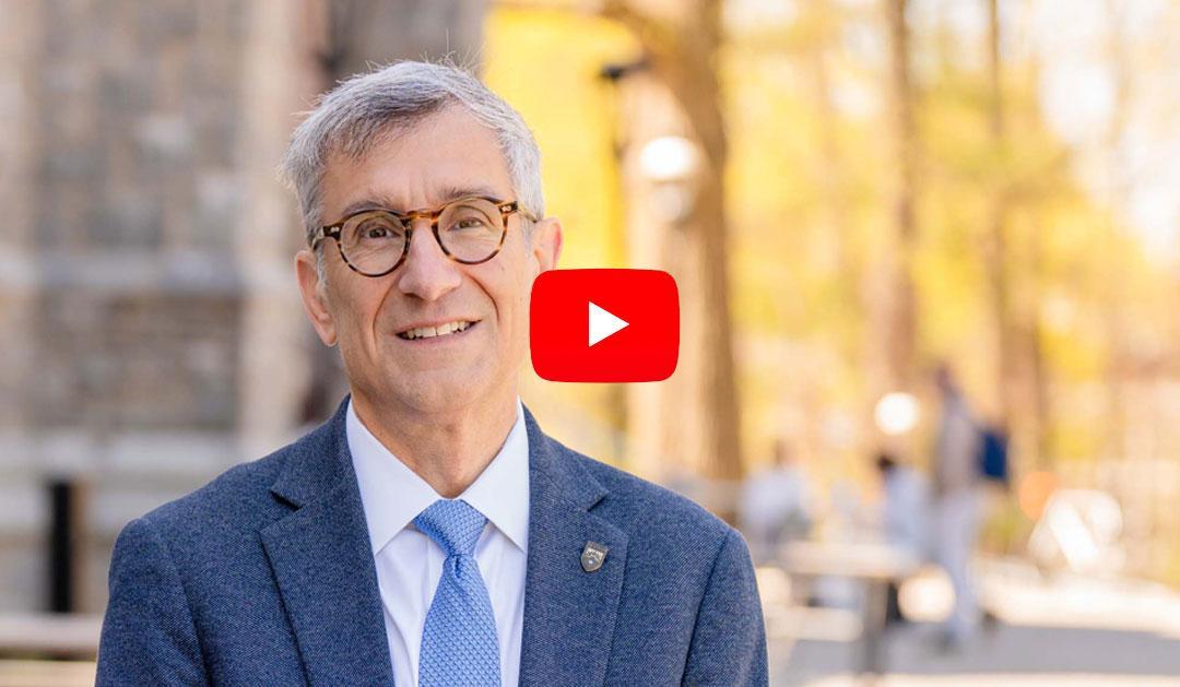 President Helble standing in front of Clayton University Center