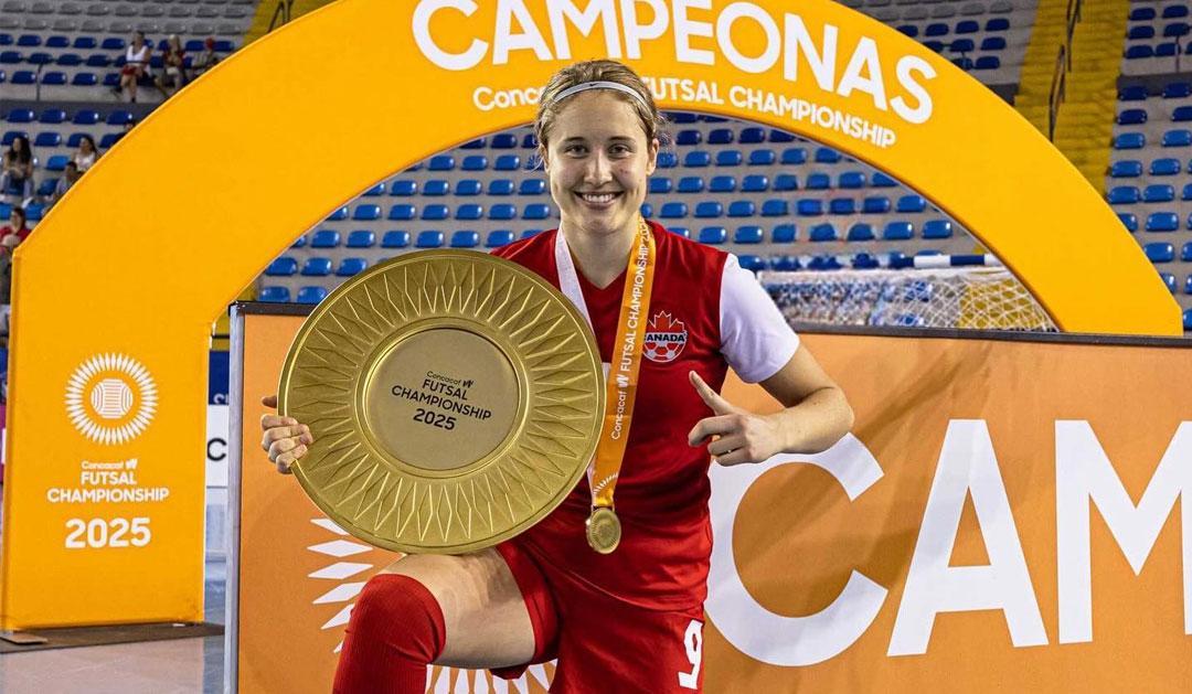 Esther Brossard holding award