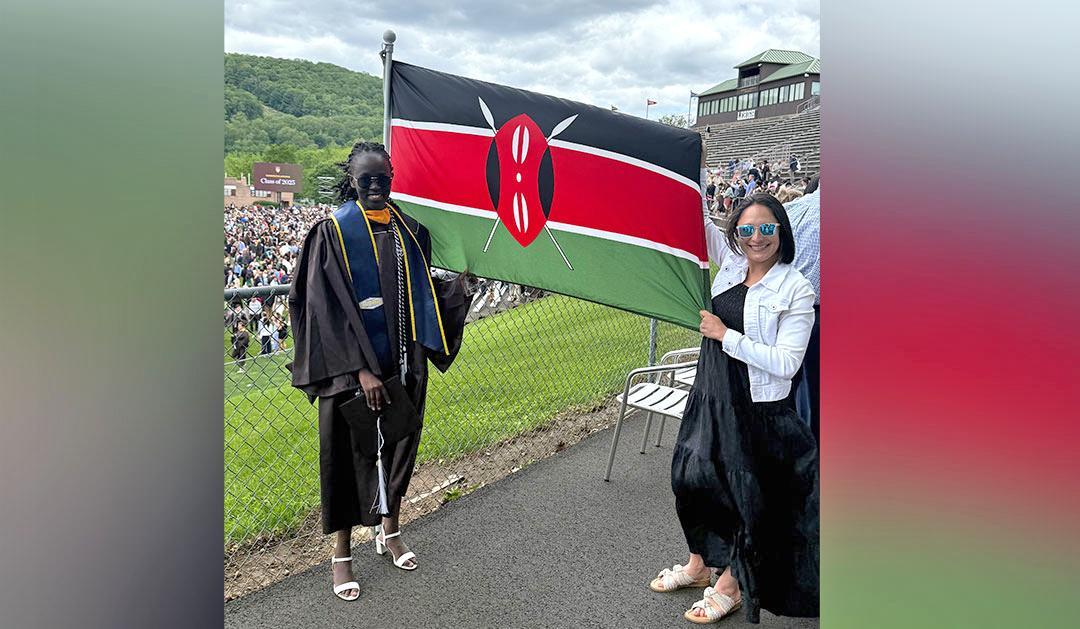 Athiel Mading and Elena (Caruso-Myers) Troy with Kenyan flag
