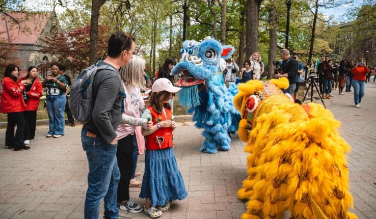 Chinese dancing dragons interacting with crowd