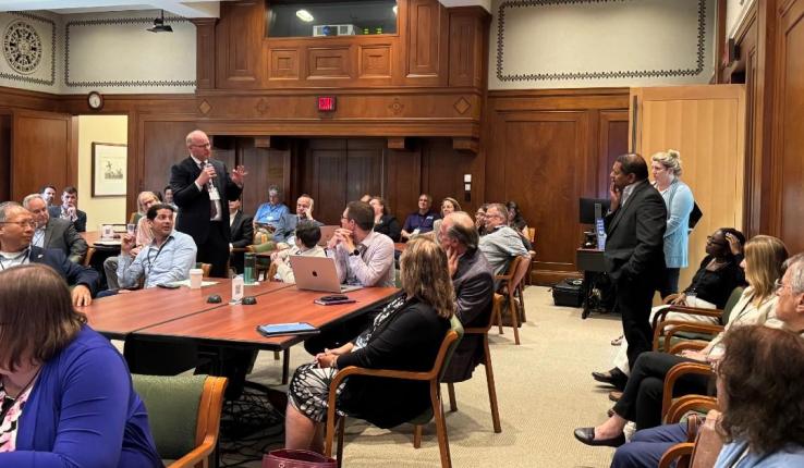 Provost Nathan Urban speaking to attendees