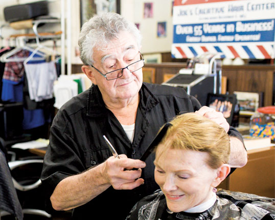 Joe D’Ambrosio giving a haircut