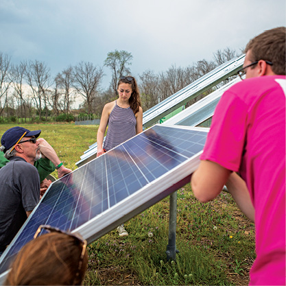 Students working on solar panels