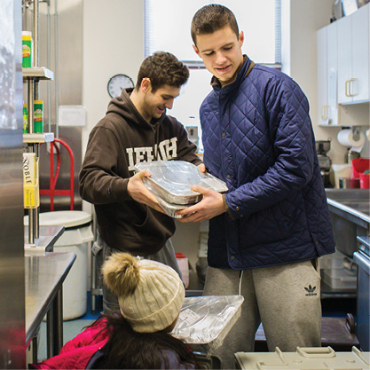 Students packing leftover food